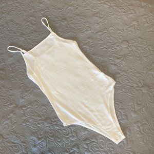 Teen white body suite. Size XS white. New without tags